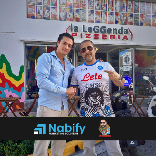 Il titolare de La Leggenda Pizzeria davanti al suo locale insieme a Nabil di Nabify
